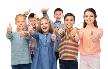 happy children showing thumbs up