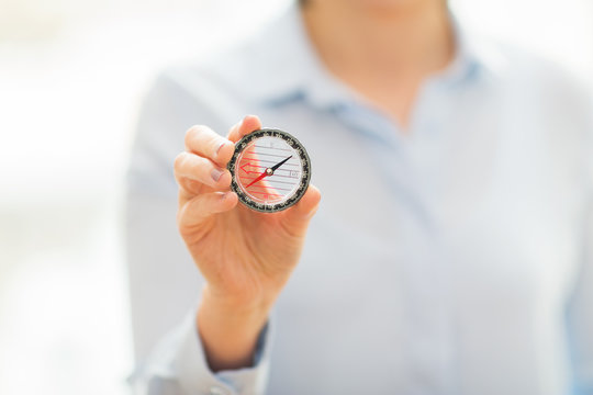 Close Up Of Woman Hand Holding Compass