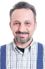 Obraz premium Close-up portrait of cheerful mechanic standing and smiling