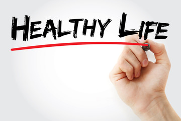Hand writing Healthy Life with marker, health concept background