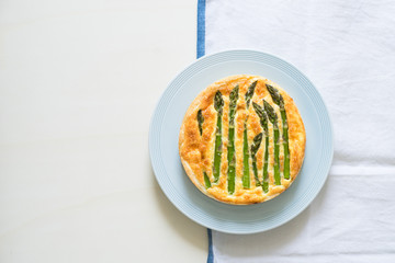 Asparagus tart with egg and cheese filling