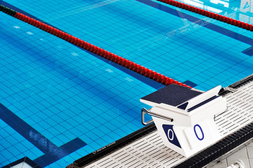 Starting blocks and lanes in a swimming pool