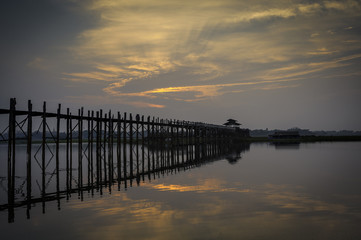 Fototapeta na wymiar Ubein Bridge in sunrise, Mandalay, Myanmar