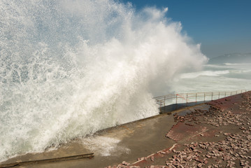 Fototapeta na wymiar Strong Waves Crashing into Sao Conrado beach promenade in Rio de Janeiro