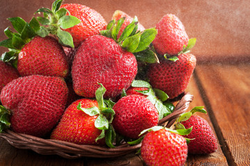 Fresh organic ripe strawberry with water splash