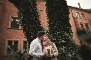 Fototapeta premium Love story of happy couple in Krakow
