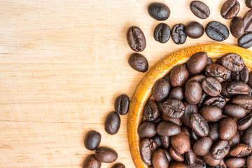 Roasted Coffee Beans background texture on wood background