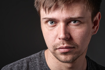 Fototapeta premium Portrait of casual young man with light beard