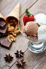 Ice cream sundae, waffle cone and chocolate pieces 