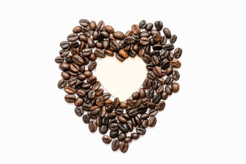 heart shape made with roasted coffee beans