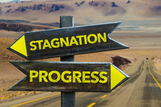 Stagnation - Progress crossroad in a desert background