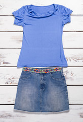 Blue denim skirt and shirt.