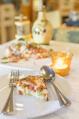 Bruschetta topped with Tomato, Mozzarella Cheese, with fresh basil leaves for a traditional Italian appetizer or snack.