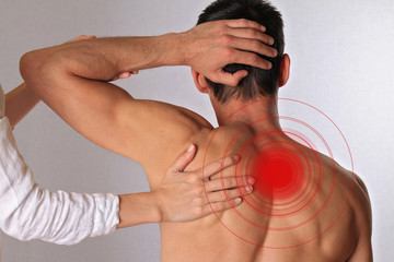 Chiropractic, osteopathy, manual therapy.Therapist  doing healing treatment on man's back....