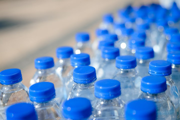 Closeup on mineral water bottles in raw