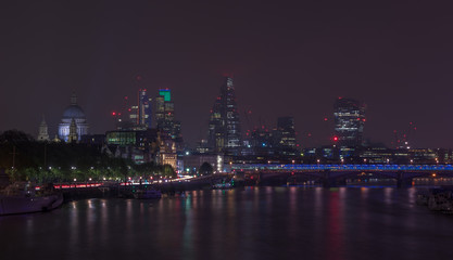Fototapeta na wymiar London cityscape at night including St, Paul’s Cathedral and Blackfriars Bridge