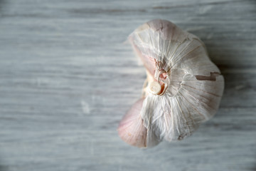 Part of garlic on old blue boards