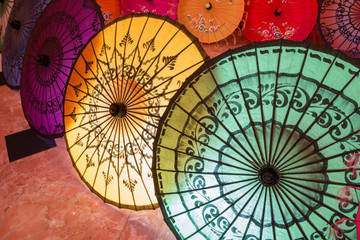 Obraz premium Traditional handicraft umbrellas are sold in night market in Bagan, Myanmar