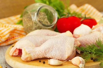 Raw chicken with vegetables and spices before cooking