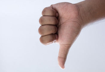 Man hand holding a thumb on a white background.