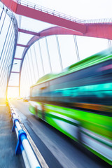 motion blurred traffic on the yangtse river bridge,chongqing china.