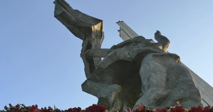 Flowers placed at a monument for victory day of World war 2, 4k