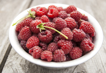 Harvest in plate berry raspberry