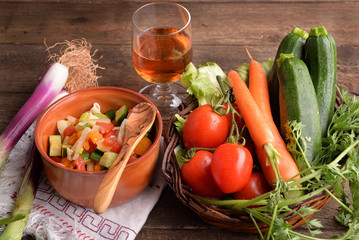 terracotta bowl with pasta and vegetables