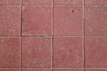 Фон бордовой тротуарной плитки
