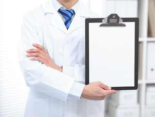 Medical sign - doctor showing clipboard.