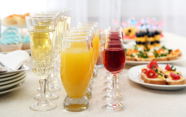 Set of cold snacks, canape, beverages, closeup