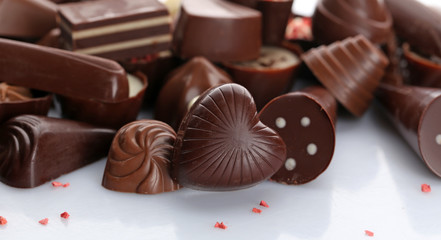 Assorted chocolate candies, close up