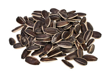 Handful of sunflower seeds, isolated on white.