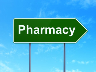 Healthcare concept: Pharmacy on road sign background