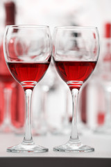 Wine glasses with red and white wine, closeup