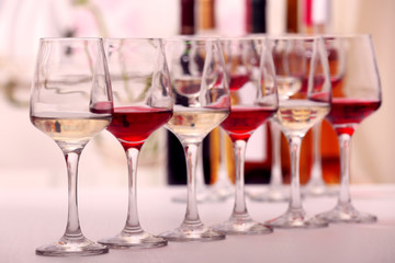 Wine glasses with red and white wine, closeup