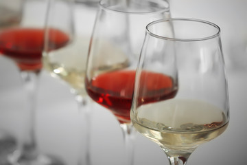 Wine glasses with red and white wine, closeup