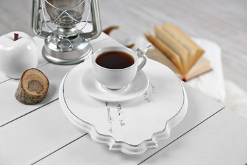 Cup of hot drink in living room. Comfortable winter weekend or holidays at home