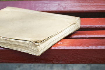Book on a wooden bench
