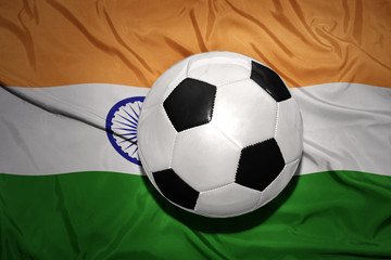Fototapeta premium black and white football ball on the national flag of india