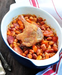Roasted duck leg  with Cassoulet beans, onions, bacon, carrots with fried pork sausage