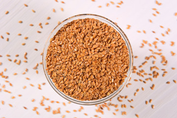 Golden linseed on glass bowl