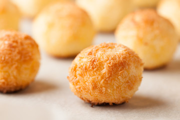 Fresh homemade coconut cookies on parchment paper