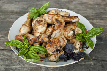 Fried chicken legs with basil