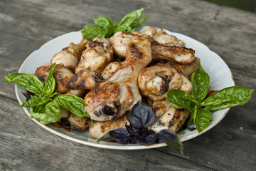 Fried chicken legs with basil