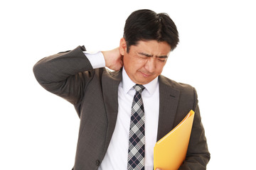 疲れた表情のビジネスマン