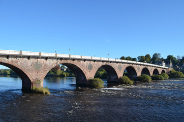 Fototapeta na wymiar Arches of Perth bridge spanning the river Tay, Perth, Scotland