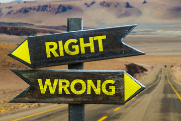 Right - Wrong crossroad in a desert background