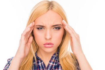 Fototapeta premium Portrait of overworked tired woman with strong headache
