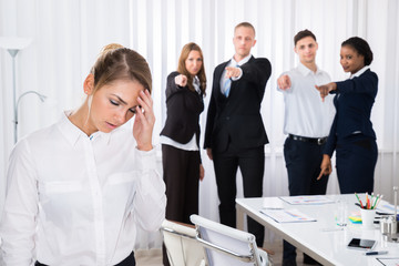 Frustrated Female Colleague In Office